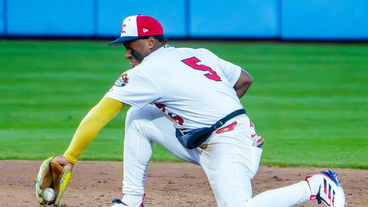 Peoria shortstop Jesús Baéz backhands a tough throw to second for a force out against South Bend during the Chiefs' home opener Tuesday, April 7, 2026 at Dozer Park in Peoria. The Chiefs routed the Cubs 10-1. Peoria shortstop Jesús Baéz backhands a tough throw to second for a force out against South Bend during the Chiefs' home opener Tuesday, April 7, 2026 at Dozer Park in Peoria. The Chiefs routed the Cubs 10-1.