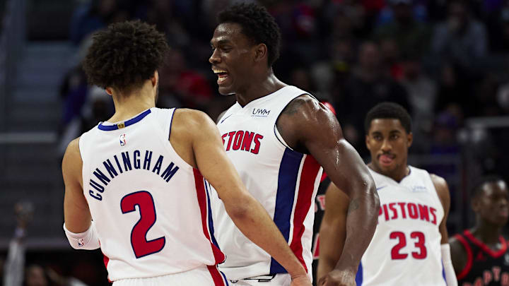 Dec 30, 2023; Detroit, Michigan, USA;  Detroit Pistons center Jalen Duren (0) and guard Cade Cunningham (2) celebrate in the second half against the Toronto Raptors at Little Caesars Arena. Mandatory Credit: Rick Osentoski-Imagn Images