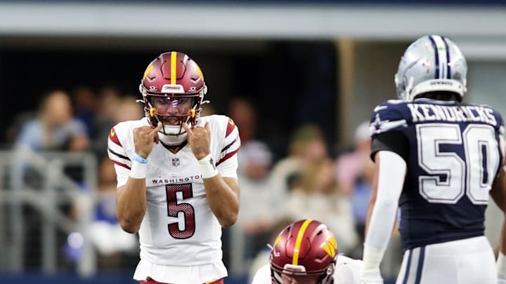 Jan 5, 2025; Arlington, Texas, USA; Washington Commanders quarterback Jayden Daniels (5) calls a play against the Dallas Cowboys during the second quarter at AT&T Stadium. Mandatory Credit: Tim Heitman-Imagn Images Jan 5, 2025; Arlington, Texas, USA; Washington Commanders quarterback Jayden Daniels (5) calls a play against the Dallas Cowboys during the second quarter at AT&T Stadium. Mandatory Credit: Tim Heitman-Imagn Images