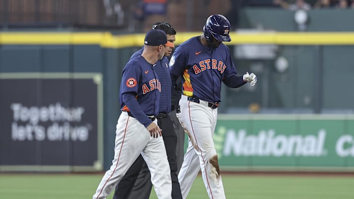 Sep 22, 2024; Houston, Texas, USA; Houston Astros left fielder Yordan Alvarez (44) walks off the field after an apparent injury during the third inning against the Los Angeles Angels at Minute Maid Park. Mandatory Credit: Troy Taormina-Imagn Images