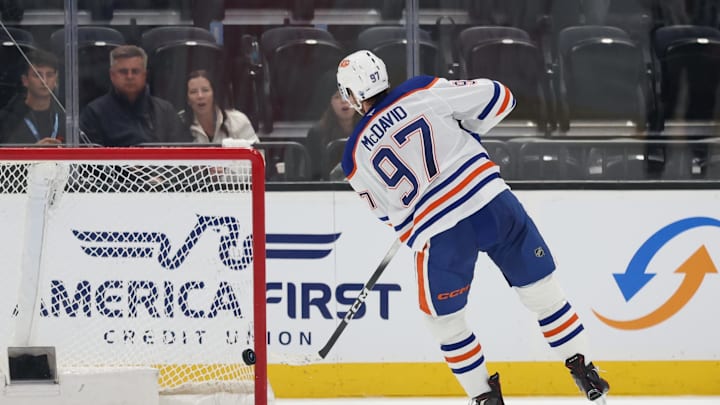Mar 24, 2026; Salt Lake City, Utah, USA; Edmonton Oilers center Connor McDavid (97) scores a goal on an open net during the third period of a game against the Utah Mammoth at Delta Center. Mandatory Credit: Rob Gray-Imagn Images