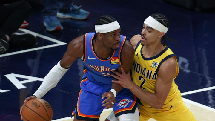 Jun 19, 2025; Indianapolis, Indiana, USA; Indiana Pacers guard Andrew Nembhard (2) defends against Oklahoma City Thunder guard Shai Gilgeous-Alexander (2) in the first quarter during game six of the 2025 NBA Finals at Gainbridge Fieldhouse. Mandatory Credit: Trevor Ruszkowski-Imagn Images