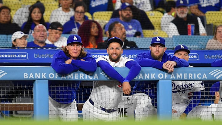 Aug 29, 2024; Los Angeles, California, USA; Los Angeles Dodgers pitcher Tyler Glasnow (31) outfielder Kevin Kiermaier (93) and third base Max Muncy (13) watch game action against the Baltimore Orioles during the ninth inning at Dodger Stadium. Mandatory Credit: Gary A. Vasquez-Imagn Images