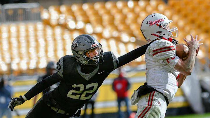 Fort Cherry's Matt Sieg intercepts a pass in front of South Side's Andrew Corfield during Friday's Class 1A WPIAL championship game at Acrisure Stadium in Pittsburgh. Fort Cherry's Matt Sieg intercepts a pass in front of South Side's Andrew Corfield during Friday's Class 1A WPIAL championship game at Acrisure Stadium in Pittsburgh.