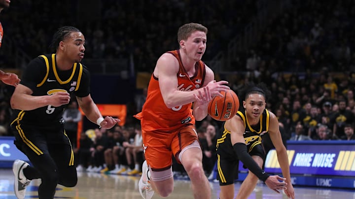 Virginia Tech Hokies Sean Pedulla (3) loses control of the ball while driving to the basket during