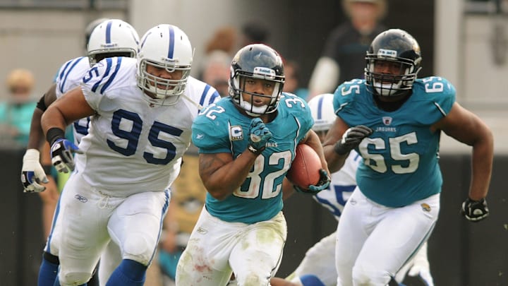 Jacksonville Jaguars running back Maurice Jones-Drew (32) runs for 56 yards as he breaks the team's single season rushing yard record just over 5 minutes into the third quarter against the Indianapolis Colts on January 1, 2012. It was also the final game for the former owners of the Jaguars Wayne Weaver and Delores Barr Weaver. [Kelly Jordan/Florida Times-Union]

Spt 04jagscoltskj010