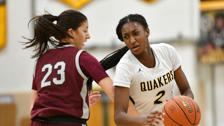 Beaver's Chloe List presses as Quaker Valley's Mimi Thiero brings the ball down the court during Monday's game at Quaker Valley High School.