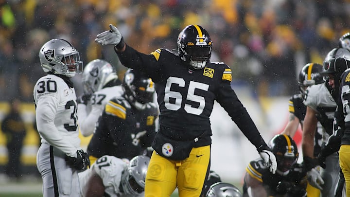 Pittsburgh Steelers Dan Moore Jr. (65) signals for a first down during the first half against the Las Vegas Raiders at Acrisure Stadium in Pittsburgh, PA on December 24, 2022.

Pittsburgh Steelers Vs Las Vegas Raiders Week 16