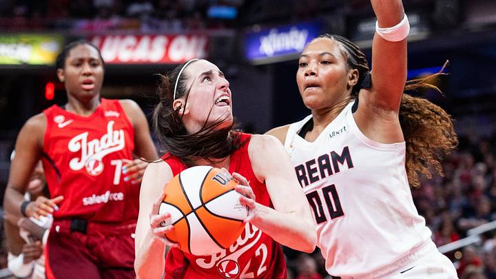 Jun 18, 2026; Indianapolis, Indiana, USA; Indiana Fever guard Caitlin Clark (22) shoots against Atlanta Dream forward Naz Hillmon (00) in the second half at Gainbridge Fieldhouse. Mandatory Credit: Trevor Ruszkowski-Imagn Images Jun 18, 2026; Indianapolis, Indiana, USA; Indiana Fever guard Caitlin Clark (22) shoots against Atlanta Dream forward Naz Hillmon (00) in the second half at Gainbridge Fieldhouse. Mandatory Credit: Trevor Ruszkowski-Imagn Images