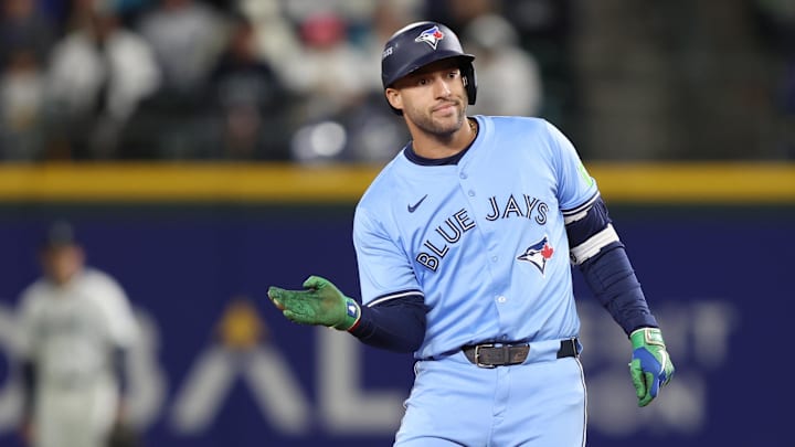 Oct 16, 2025; Seattle, Washington, USA; Toronto Blue Jays designated hitter George Springer (4) reacts after a double in the fourth inning against the Seattle Mariners during game four of the ALCS round for the 2025 MLB playoffs at T-Mobile Park.