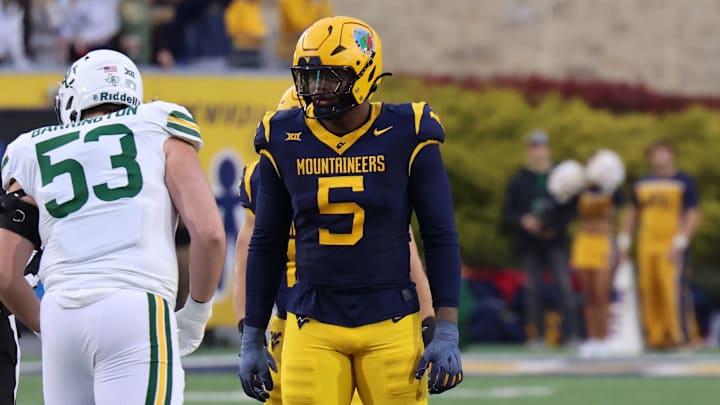 West Virginia University defensive lineman Sean Martin (5). West Virginia University defensive lineman Sean Martin (5).