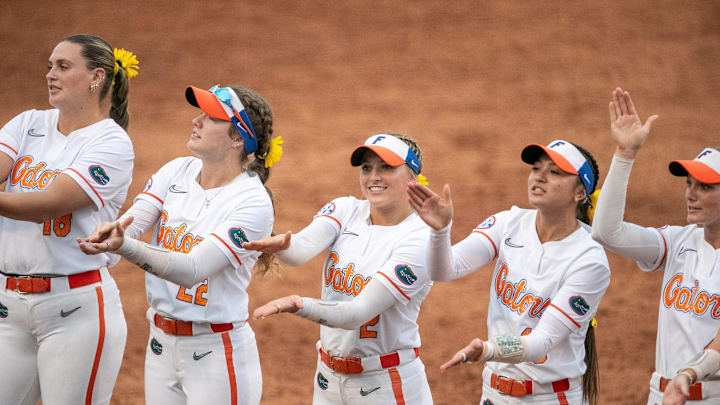 Florida gator chomps with the crowd after defeating Oklahoma 6-4 during a NCAA softball game at Katie Seashole Pressly Stadium in Gainesville, FL on Saturday, May 3, 2025. [Alan Youngblood/Gainesville Sun]