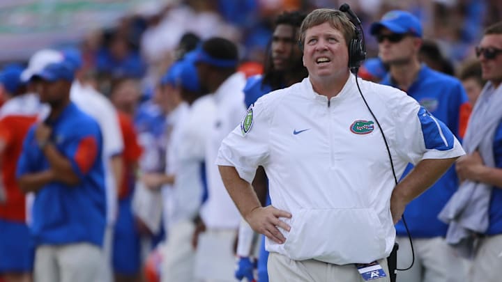 Sep 26, 2015; Gainesville, FL, USA; Florida Gators head coach Jim McElwain looks up against the Tennessee Volunteers during the first half at Ben Hill Griffin Stadium. Mandatory Credit: Kim Klement-Imagn Images
