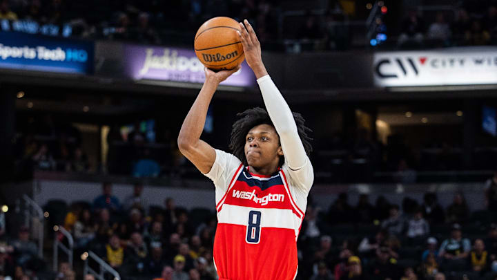Apr 8, 2025; Indianapolis, Indiana, USA; Washington Wizards guard Bub Carrington (8) shoots the ball in the second half against the Indiana Pacers at Gainbridge Fieldhouse. Mandatory Credit: Trevor Ruszkowski-Imagn Images