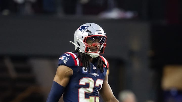 Dec 15, 2024; Glendale, Arizona, USA; New England Patriots safety Kyle Dugger (23) against the Arizona Cardinals at State Farm Stadium. Mandatory Credit: Mark J. Rebilas-Imagn Images