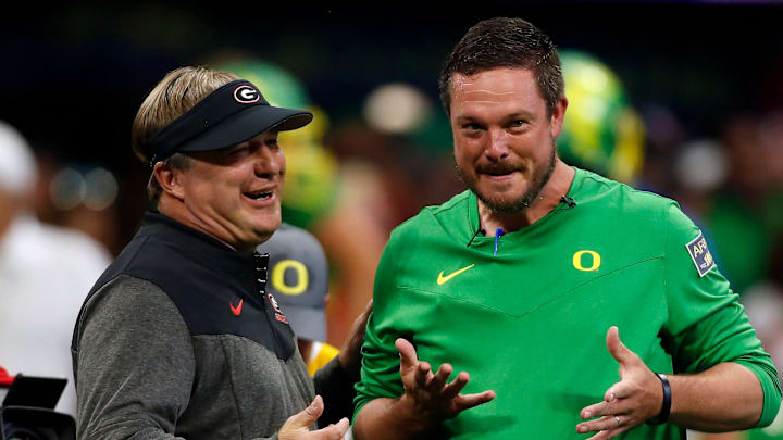 Georgia head coach Kirby Smart and Oregon head coach Dan Lanning meet during warm ups before the start of the Chick-fil-A Kickoff NCAA college football game between Oregon and Georgia in Atlanta, on Saturday, Sept. 3, 2022.

News Joshua L Jones