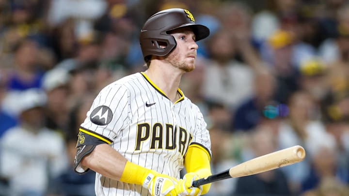 Sep 23, 2025; San Diego, California, USA; San Diego Padres first baseman Ryan O'Hearn (32) hits a grand slam during the first inning against the Milwaukee Brewers at Petco Park. Mandatory Credit: David Frerker-Imagn Images