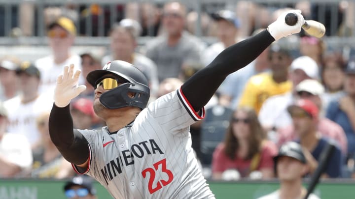 Minnesota Twins pinch hitter Royce Lewis (23) drives in a run with a sacrifice fly against the Pittsburgh Pirates during the sixth inning at PNC Park in Pittsburgh on June 9, 2024. Minnesota Twins pinch hitter Royce Lewis (23) drives in a run with a sacrifice fly against the Pittsburgh Pirates during the sixth inning at PNC Park in Pittsburgh on June 9, 2024.