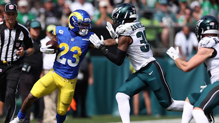 Sep 21, 2025; Philadelphia, Pennsylvania, USA; Los Angeles Rams running back Kyren Williams (23) rushes the ball past Philadelphia Eagles linebacker Jihaad Campbell (30) during the first half at Lincoln Financial Field. Mandatory Credit: Bill Streicher-Imagn Images Sep 21, 2025; Philadelphia, Pennsylvania, USA; Los Angeles Rams running back Kyren Williams (23) rushes the ball past Philadelphia Eagles linebacker Jihaad Campbell (30) during the first half at Lincoln Financial Field. Mandatory Credit: Bill Streicher-Imagn Images