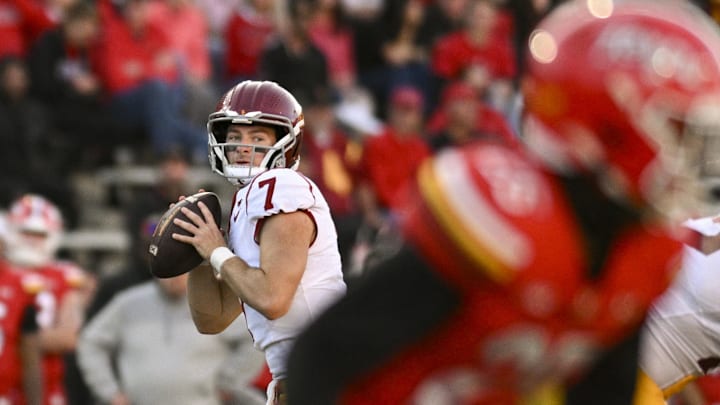 Oct 19, 2024; College Park, Maryland, USA; Southern California Trojans quarterback Miller Moss (7) looks down field as Maryland Terrapins linebacker Keyshawn Flowers (23) drops back in coverage during the second half at SECU Stadium. Mandatory Credit: Tommy Gilligan-Imagn Images Oct 19, 2024; College Park, Maryland, USA; Southern California Trojans quarterback Miller Moss (7) looks down field as Maryland Terrapins linebacker Keyshawn Flowers (23) drops back in coverage during the second half at SECU Stadium. Mandatory Credit: Tommy Gilligan-Imagn Images