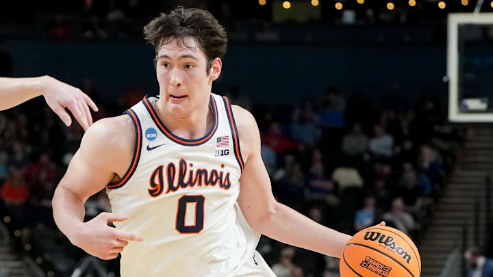 Mar 19, 2026; Greenville, SC, USA; Illinois Fighting Illini forward David Mirkovic (0) dribbles the ball against the Penn Quakers in the first half of a first round game of the men's 2026 NCAA Tournament at Bon Secours Wellness Arena. Mandatory Credit: Bob Donnan-Imagn Images