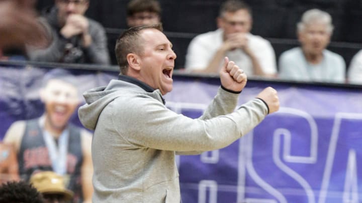 Santa Fe Head Coach Mike Blicher screams at a bad call from the referees in the fourth quarter. Riviera Prep defeated Santa Fe Catholic 66 -54 to win the FHSAA 2A State Boys basketball Championship game at the RP Funding Center in Lakeland Fl. February 28th 2025. Photos special to the Ledger / Calvin Knight