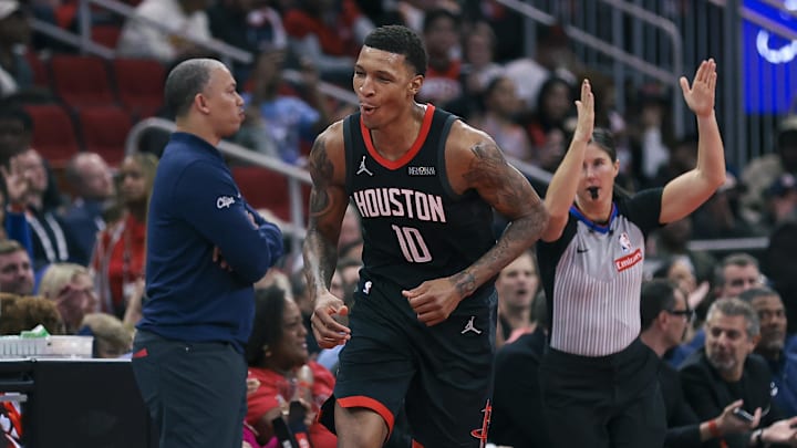 Nov 15, 2024; Houston, Texas, USA; Houston Rockets forward Jabari Smith Jr. (10) reacts after making a basket during the second quarter against the Los Angeles Clippers at Toyota Center. Mandatory Credit: Troy Taormina-Imagn Images