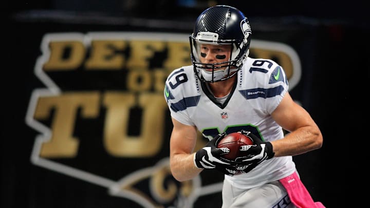 Seattle Seahawks wide receiver Bryan Walters runs the ball against the St. Louis Rams.