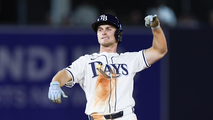 Mar 31, 2025; St. Petersburg, Florida, USA; Tampa Bay Rays right fielder Jake Mangum (28) celebrates after hitting a double against the Pittsburgh Pirates in the sixth inning  at George M. Steinbrenner Field. Mandatory Credit: Nathan Ray Seebeck-Imagn Images