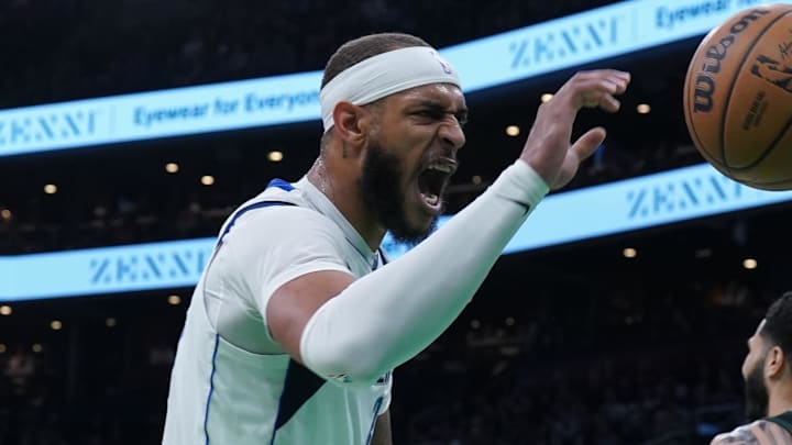 Feb 6, 2025; Boston, Massachusetts, USA; Dallas Mavericks center Daniel Gafford (21) reacts to a play against the Boston Celtics in the second quarter at TD Garden. Mandatory Credit: David Butler II-Imagn Images