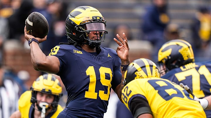 Team Blue quarterback Bryce Underwood (19) makes a pass against Team Maize during the second half of the spring game at Michigan Stadium in Ann Arbor on Saturday, April 19, 2025.