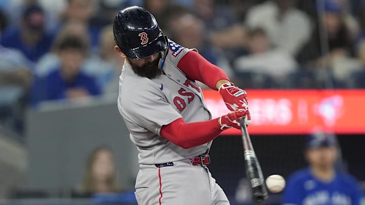 Sep 25, 2025; Toronto, Ontario, CAN; Boston Red Sox catcher Connor Wong (12) makes contact with the ball against the Toronto Blue Jays during the sixth inning at Rogers Centre. Mandatory Credit: John E. Sokolowski-Imagn Images