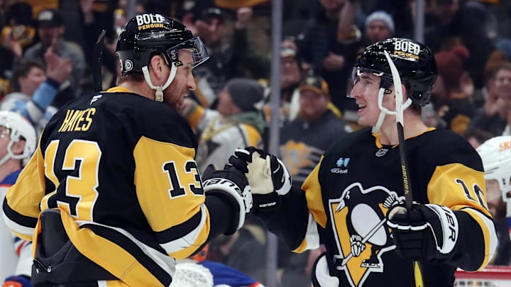 Jan 9, 2025; Pittsburgh, Pennsylvania, USA;  Pittsburgh Penguins right wing Kevin Hayes (13) celebrates his goal with left wing Drew O'Connor (10) against the Edmonton Oilers during the first period at PPG Paints Arena. Mandatory Credit: Charles LeClaire-Imagn Images