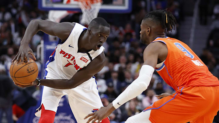 Mar 4, 2020; Detroit, Michigan, USA; Detroit Pistons forward Thon Maker (7) controls the ball against Oklahoma City Thunder center Nerlens Noel (9) at Little Caesars Arena. Mandatory Credit: Rick Osentoski-Imagn Images