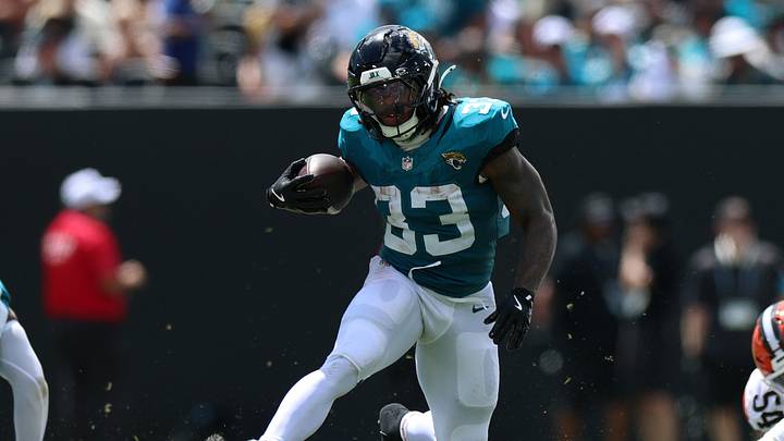 Sep 13, 2026; Jacksonville, Florida, USA;  Jacksonville Jaguars running back Bhayshul Tuten (33) runs the ball in the second quarter against the Cleveland Browns at EverBank Stadium.  Mandatory Credit: Nathan Ray Seebeck-Imagn Images