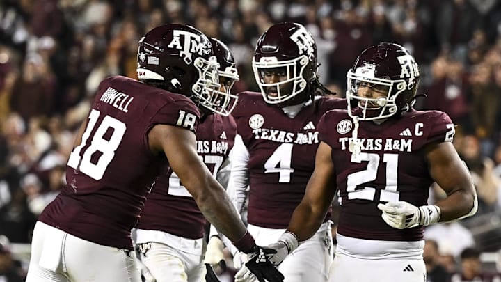 Nov 30, 2024; College Station, Texas, USA; Texas A&M Aggies linebacker Taurean York (21) reacts against the Texas Longhorns during the second half. The Longhorns defeated the Aggies 17-7 at Kyle Field. Mandatory Credit: Maria Lysaker-Imagn Images  