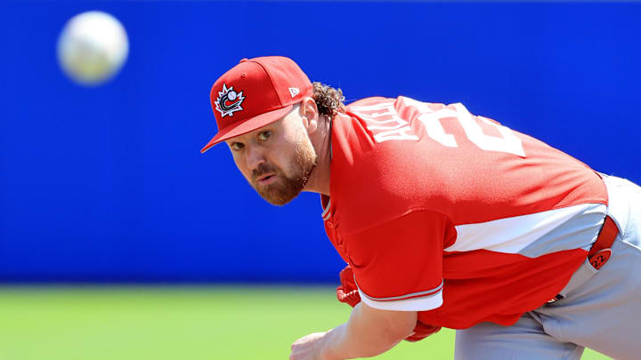 Mar 3, 2026; Dunedin, FL, USA; Canada starting pitcher Logan Allen (22) throws a pitch during the first inning against the Toronto Blue Jays at TD Ballpark. Mandatory Credit: Kim Klement Neitzel-Imagn Images