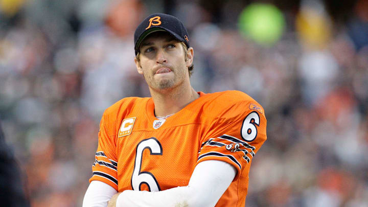 Jay Cutler stands on the sideline during a game against the Packers in 2011