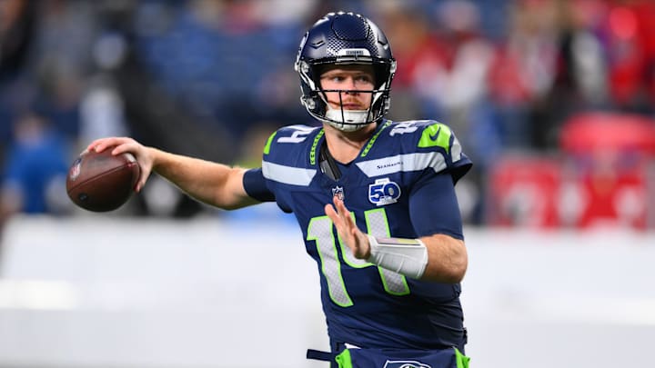 Oct 20, 2025; Seattle, Washington, USA; Seattle Seahawks quarterback Sam Darnold (14) warms up prior to the game against the Houston Texans at Lumen Field. 