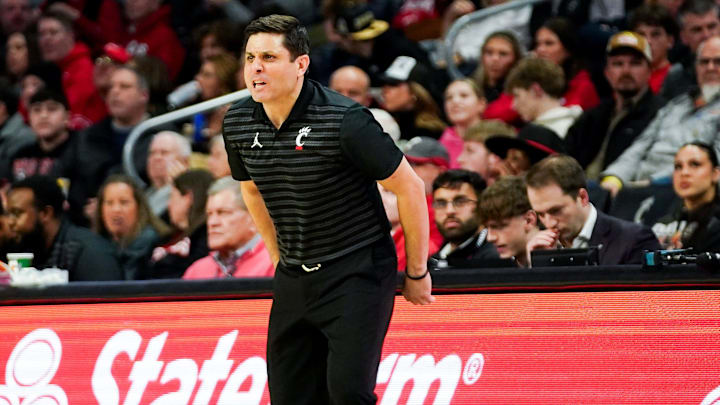Cincinnati Bearcats head coach Wes Miller coaches in the first half of a NCAA men’s basketball game between the Cincinnati Bearcats and Texas Tech Red Raiders, Tuesday, Jan. 21, 2025, at Fifth Third Arena in Cincinnati Cincinnati Bearcats head coach Wes Miller coaches in the first half of a NCAA men’s basketball game between the Cincinnati Bearcats and Texas Tech Red Raiders, Tuesday, Jan. 21, 2025, at Fifth Third Arena in Cincinnati