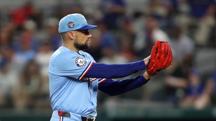 Jul 7, 2024; Arlington, Texas, USA;  Texas Rangers pitcher Nathan Eovaldi (17) starts his wide up in the first inning against the Tampa Bay Rays at Globe Life Field. Mandatory Credit: Tim Heitman-USA TODAY Sports