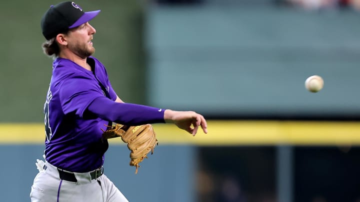 Jun 26, 2024; Houston, Texas, USA; Colorado Rockies third baseman Ryan McMahon (24) throws a fielded ball to first base for an out against the Houston Astros during the first inning at Minute Maid Park. Mandatory Credit: Erik Williams-USA TODAY Sports Jun 26, 2024; Houston, Texas, USA; Colorado Rockies third baseman Ryan McMahon (24) throws a fielded ball to first base for an out against the Houston Astros during the first inning at Minute Maid Park. Mandatory Credit: Erik Williams-USA TODAY Sports