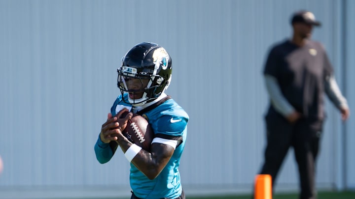 Jacksonville Jaguars wide receiver Travis Hunter (12) turns upfield after hauling in a pass during the Jacksonville Jaguars’ third mandatory minicamp Thursday June 12, 2025 at the Miller Electric Center in Jacksonville, Fla. [Doug Engle/Florida Times-Union]