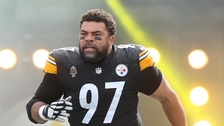 Heyward reacts as he runs onto the field. 