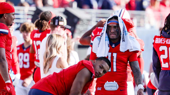 Oct 19, 2024; Tucson, Arizona, USA; Arizona Wildcats quarterback Noah Fifita (11) puts a towel over his head at the end of the fourth quarter against the Colorado Buffaloes at Arizona Stadium. Mandatory Credit: Aryanna Frank-Imagn Images