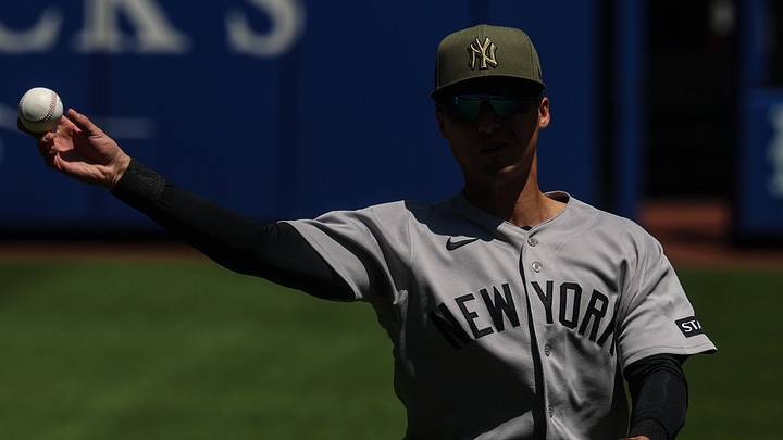 May 17, 2026; New York City, New York, USA; New York Yankees shortstop Anthony Volpe (11) warms up before the game against the New York Mets at Citi Field. Mandatory Credit: Vincent Carchietta-Imagn Images