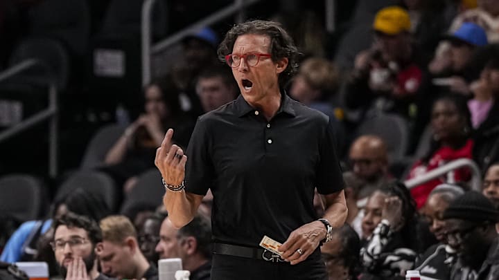 Apr 10, 2024; Atlanta, Georgia, USA; Atlanta Hawks head coach Quin Snyder reacts during the game against the Charlotte Hornets during the second half at State Farm Arena. Mandatory Credit: Dale Zanine-Imagn Images