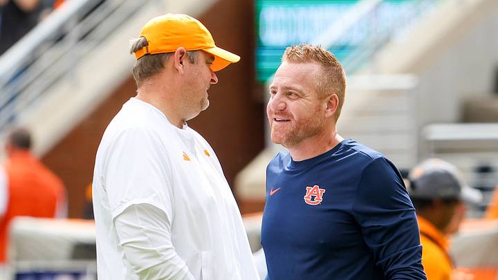 Oct 3, 2026; Knoxville, Tennessee, USA; Tennessee Volunteers head coach Josh Heupel and Auburn Tigers head coach Alex Golesh speak before the game at Neyland Stadium. Mandatory Credit: Randy Sartin-Imagn Images Oct 3, 2026; Knoxville, Tennessee, USA; Tennessee Volunteers head coach Josh Heupel and Auburn Tigers head coach Alex Golesh speak before the game at Neyland Stadium. Mandatory Credit: Randy Sartin-Imagn Images