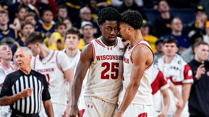 Wisconsin guard John Blackwell (25), left, celebrates a play against Michigan with guard Nick Boyd (2) during the second half at Crisler Center in Ann Arbor on Saturday, Jan. 10, 2026.