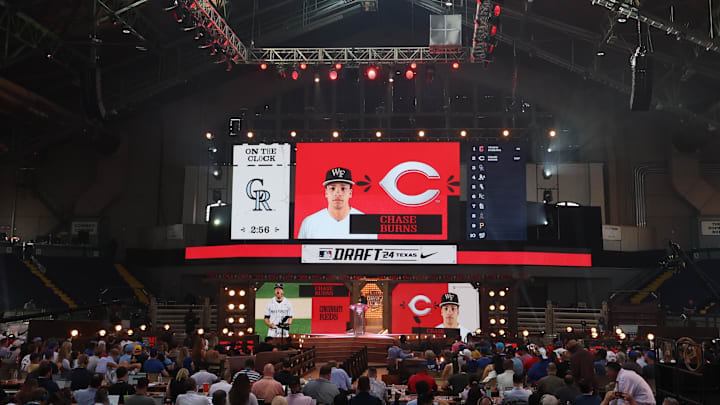 Jul 14, 2024; Ft. Worth, TX, USA; The Cincinnati Reds select Chase Burns with the second pick during the first round of the MLB Draft at Cowtown Coliseum. Mandatory Credit: Kevin Jairaj-Imagn Images Jul 14, 2024; Ft. Worth, TX, USA; The Cincinnati Reds select Chase Burns with the second pick during the first round of the MLB Draft at Cowtown Coliseum. Mandatory Credit: Kevin Jairaj-Imagn Images